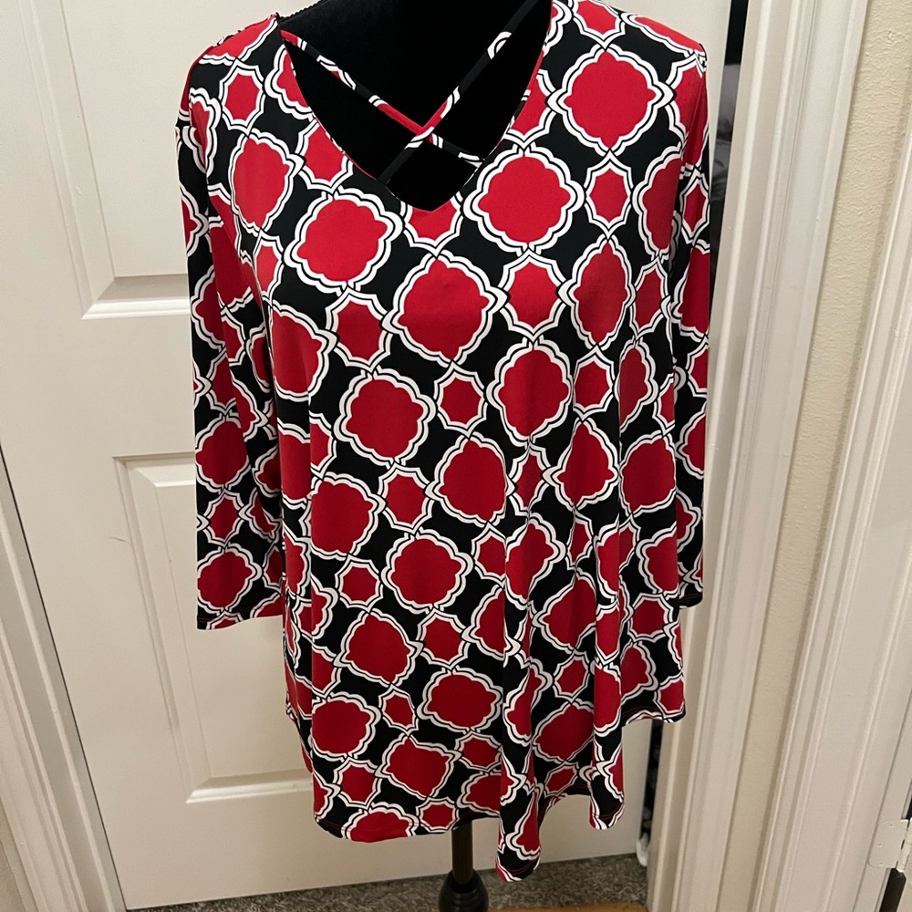 Chico’s Boutique knit top with crisscross feature.